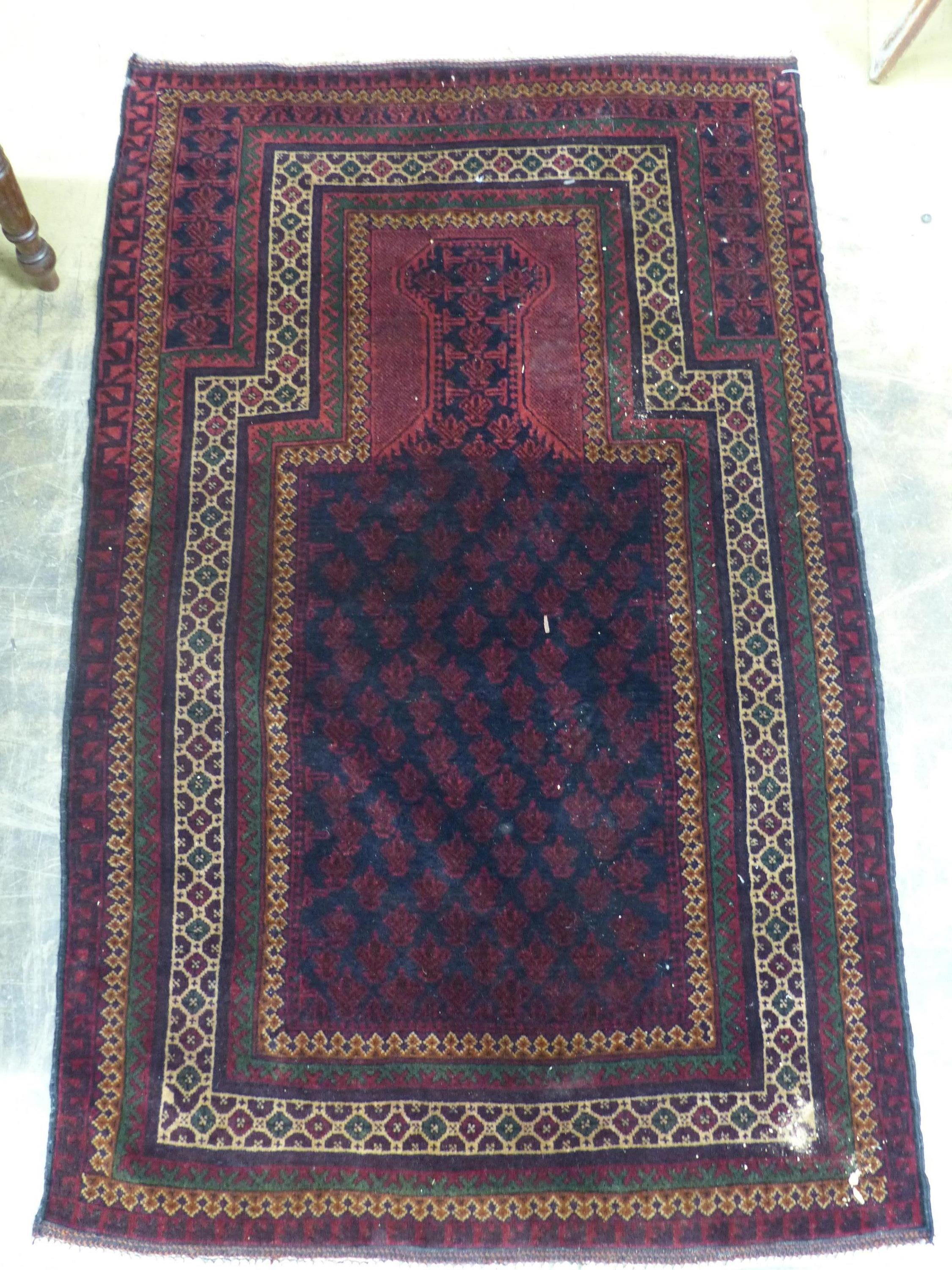 A Belouch red ground prayer rug, 146 x 90cm